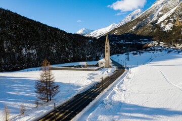 Fototapeta premium Bormio, Italy, aerial view of the church of San Gallo