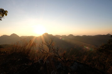 Sunset on mountains panoramic view in nature wallpaper background