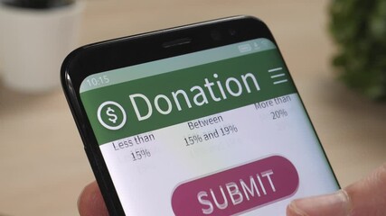 Making an online donation to a charity using a smartphone app.