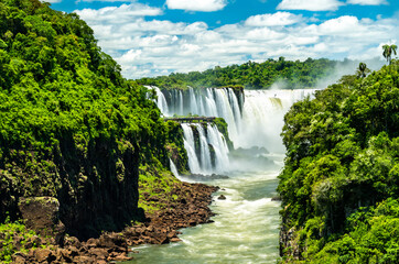 View from the jungle to Iguazu Falls, the largest waterfall in the world. UNESCO world heritage in Brazil and Argentina