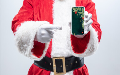 Close up hands of Santa Claus holding device with stylish design on the screen, copyspace. Concept of winter sales, New Year 2021 and Christmas celebration, modern device and gadgets, online shopping.