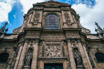 Fototapeta na wymiar Aged catholic church with arched windows