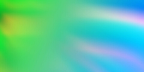 Blurred background with light green and blue colors.