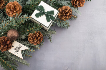 An ornament on a Christmas tree. Christmas tree with decor as background.
