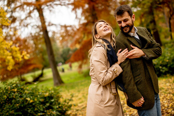 Young couple in the autumn park