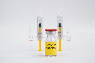 A single bottle vial of Covid-19 coronavirus vaccine and syringe. A covid-19 coronavirus vaccination concept. It use for prevention and immunization. Vaccine concept on white background.