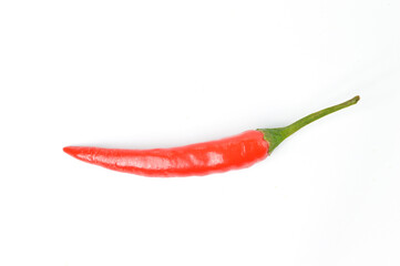 Top view of red chili pepper sliced with turmeric powder isolated on a white background