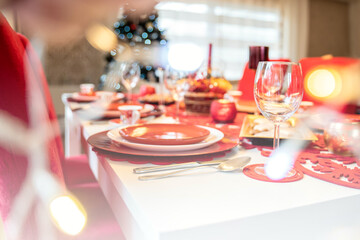 Photo of Christmas holidays red table setting concept.