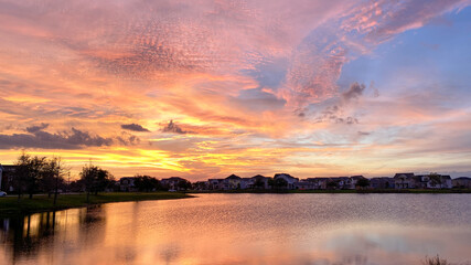 Beautiful pink, orange and blue sunset reflecting on a lake