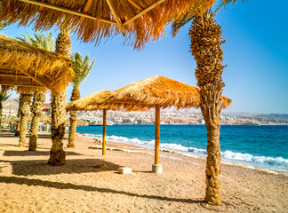 Morning on central public beach in Eilat - famous tourist resort and recreational city in Israel