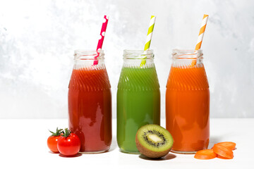 variety of fresh juices in bottles