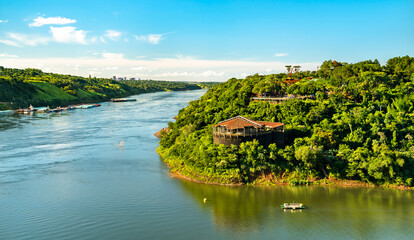 The triple border of Paraguay, Argentina and Brazil at the confluence of the Parana and Iguazu rivers - obrazy, fototapety, plakaty