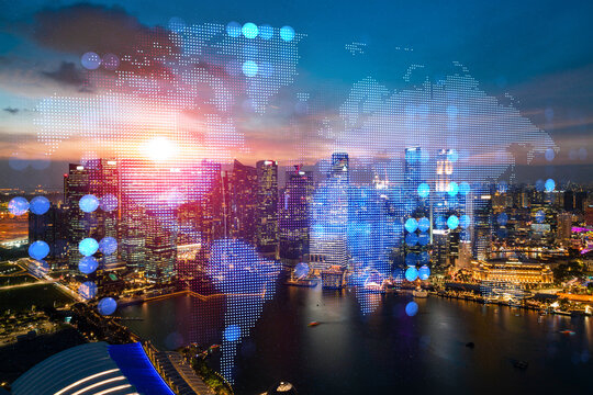 Glowing hologram of Earth planet map on aerial panoramic cityscape of Singapore at sunset, Asia. The concept of international business. Multi Exposure.