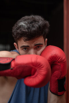 male boxing throwing hook 