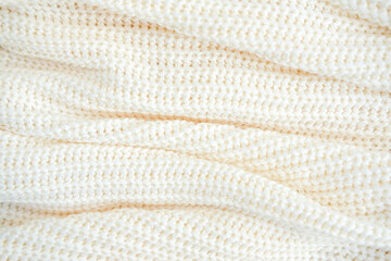 the binding texture is white thread . fragment of a sweater