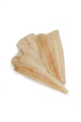 Fresh raw large pieces of Pangasius dolly fish on a white plate. Fresh fish for sale in the market. Top view, isolate.