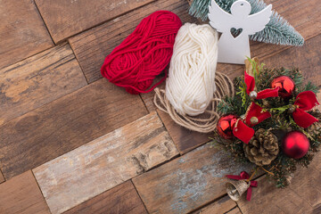 Christmas ornaments and decorations on wooden background.
