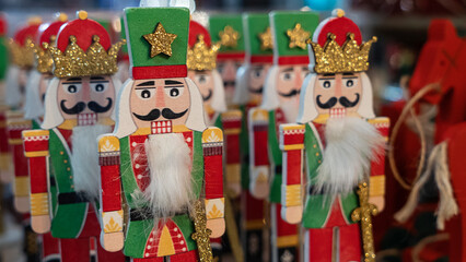 Soldier Nutcracker Statues. Decorative toy wooden nutcracker in store during Christmas holidays. Happy New Year concept.
