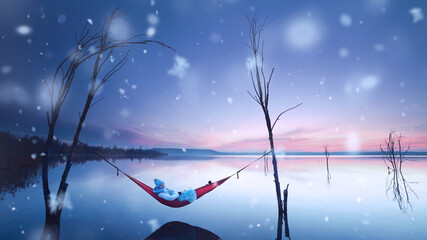Winterabend am See in der Hängematte