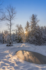 tranquil winter landscape at sunset with fresh powder snow in the Allgaeu alps, Bavaria, Germany