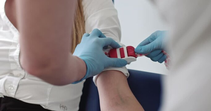 laboratory in clinic. Female lab assistant taking venous blood for test. Healthcare concept. Laboratory in clinic. Female doctor take blood sample from patient to test for coronavirus in hospital