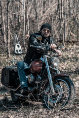 Plakat Biker portrait. Photo with a motorcycle