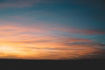 Fototapeta premium Amazing sunset in twilight sky in countryside