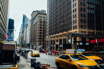 Fototapeta na wymiar Taxi cars on road in New York City