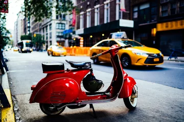  Retro motor scooter parked on street © BullRun