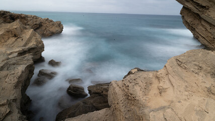 sea and white foam on windy day