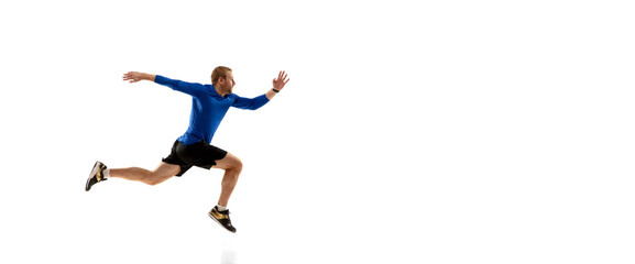 Fototapeta na wymiar Flyer. Caucasian professional jogger, runner training isolated on white studio background. Muscular, sportive man, emotional. Concept of action, motion, youth, healthy lifestyle. Copyspace for ad.