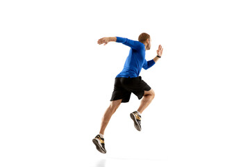 Winner. Caucasian professional jogger, runner training isolated on white studio background. Muscular, sportive man, emotional. Concept of action, motion, youth, healthy lifestyle. Copyspace for ad.
