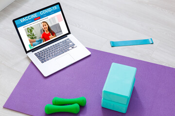 Concept of preparing vaccine from COVID-19 on the laptop screen.