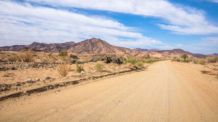 Fototapeta na wymiar Gravel road from Ai-Ais to Aus in Richtersveld Transfrontier Park, Namibia.