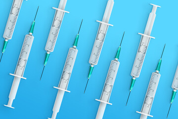 Illustration of COVID-19 vaccine in multiple syringes