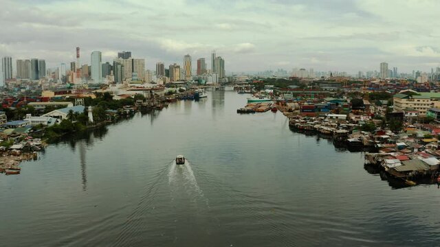 Cityscape Manila. Residential areas and business center in the city, top view. Big port city. The capital of the Philippines.