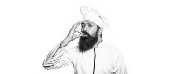 Professional chef man showing sign for delicious. Chef, cook making tasty delicious gesture by kissing fingers. Cook hat. Black and white