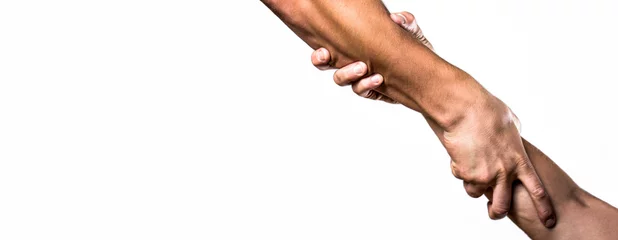 Foto op Canvas Close up help hand. Helping hand concept, support. Helping hand outstretched, isolated arm, salvation. Two hands, helping arm of a friend, teamwork. Rescue, helping gesture or hands. Copy space © Yevhen