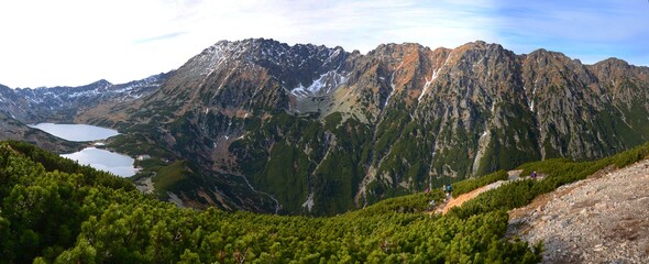 Fototapeta na wymiar Panoramic view of the Roztoki valley and the valley of the five Polish lakes in Vysoke Tara, Poland. View of the Siklawa waterfall and the Tatra lakes.