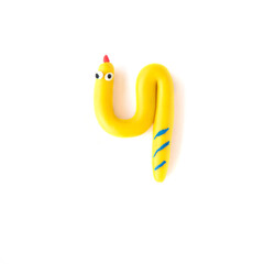Number 4 made from colorful plasticine isolated on white background. Learning numbers with child.