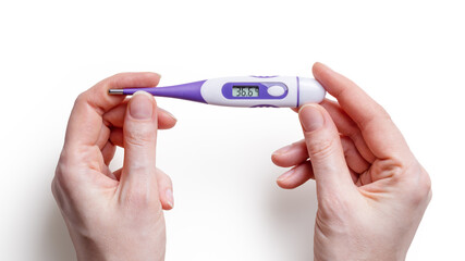 Clean medical thermometer with hands on white background