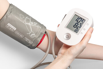 Clean medical tonometer with hands on white background
