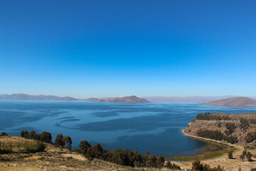 Fototapeta na wymiar Lake Titicaca, Lago Titicaca, a freshwater lake in the Andes on the border of Bolivia and Peru, often called the 
