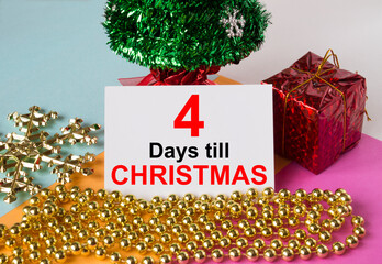 Christmas tree decorated with toys and tinsel, gift boxes and greeting card with text 4 Days till...