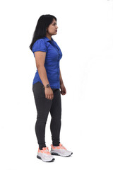 side view of full portrait of a latin woman look side on white background