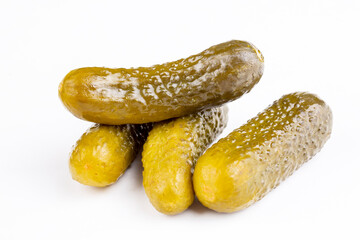 Delicious marinated pickled cucumbers, isolated on white background