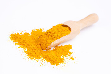 Turmeric powder isolated on white background.