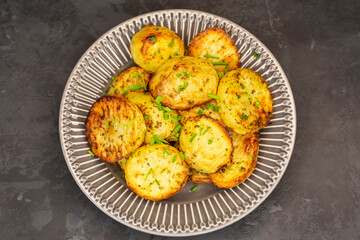 Delicious baked potato with green garlic
