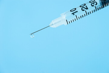 Drop on the syringe needle