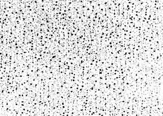 Small uneven spots and particles of debris. Abstract vector texture. Distressed uneven background. Grunge texture overlay with fine grains isolated on white background. Vector illustration. EPS10.